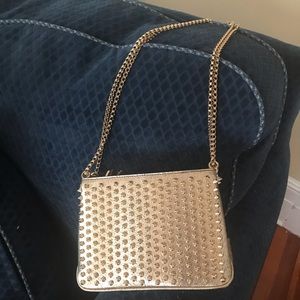 Christian Louboutin gold purse